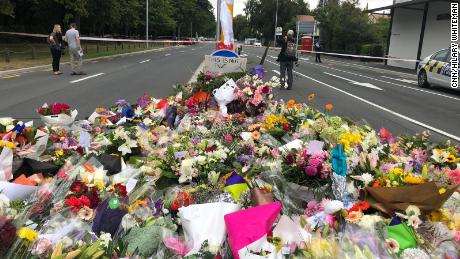 Tributes laid at the police line close to the Al Noor mosque in Christchurch where 41 people died.