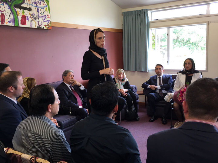 New Zealand Prime Minister Jacinda Ardern, left, speaks to representatives of the Muslim community, Saturday, March 16, 2019 