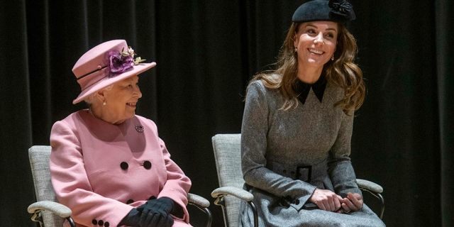 Britain's Queen Elizabeth II and Kate Duchess of Cambridge unveil a plaque at King’s College London to open Bush House South Building, the latest education and learning facilities at the Strand Campus, in London, Tuesday March 19, 2019.