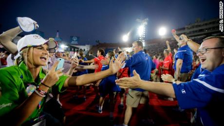 U.S athletes, right, are greeted by volunteers and athletes from the Great Britain at the 2015 Special Olympics World Games in Los Angeles.
