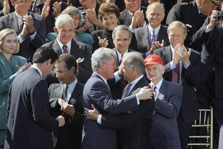 President Bill Clinton hugs then-Sen. Joe Biden in 1994 after signing the Violent Crime Control Act.&nbsp;