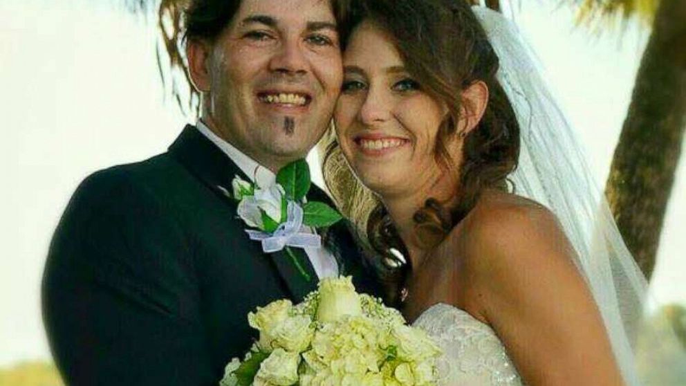 Robert Lee Cooper and Ariel Vanessa Prim are pictured in their wedding photo.