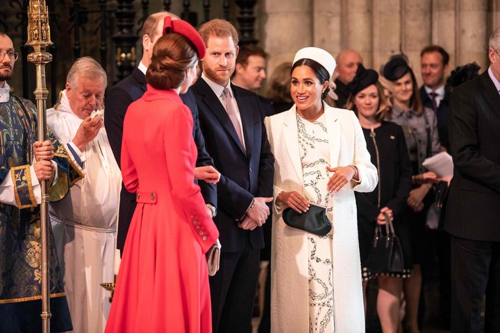 The Duchess of Cambridge (foreground) and Duchess of Sussex greet each other as they attend the Commonwealth Service with oth