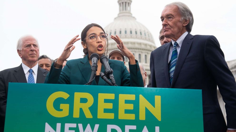 Rep. Alexandria Ocasio-Cortez Sen. Ed Markey speak during a press conference to announce Green New Deal legislation to promote clean energy programs outside the U.S. Capitol in Washington, Feb. 7, 2019.