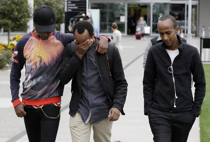 Mucad's elder brothers Abdifatah Ibrahim (center) and Abdi Ibrahim (right) with an unidentified friend in Christchurch, March