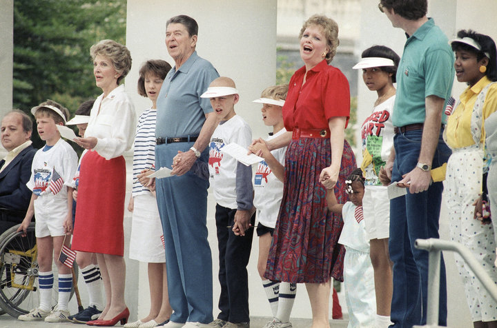 President Ronald Reagan and first lady Nancy Reagan participating in the 1986 charity event Hands Across America.