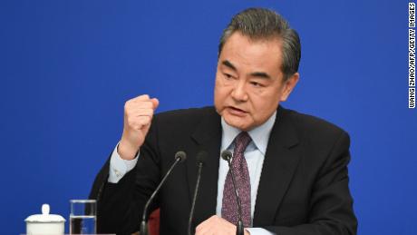 Chinese foreign minister says Huawei right to not be &#39;victimized like silent lambs&#39; 
