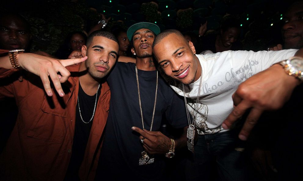 From left, Drake, Nipsey Hussle and TI visit Greenhouse on Aug. 24, 2010 in New York City.