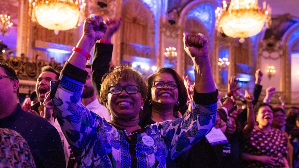 Supporters at mayoral candidate Lori Lightfoot's election night rally at the Hilton Chicago cheer as poll numbers trickle in, showing Lightfoot in the lead against Toni Preckwinkle in the Chicago mayoral election, Tuesday, April 2, 2019. (Ashlee Rezin/Chicago Sun-Times via AP)