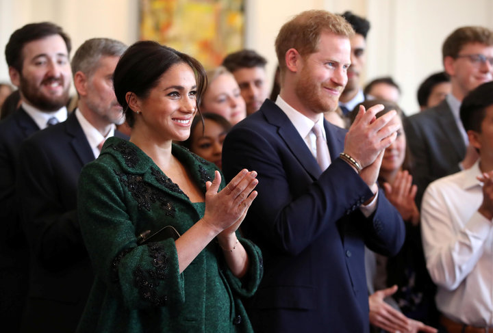 The Duke and Duchess of Sussex applaud after a Commonwealth Day youth event at Canada House in London on March 11, 2019.