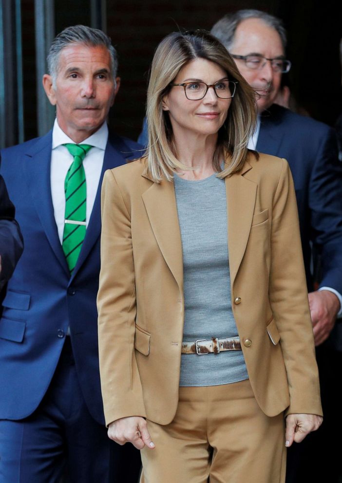 Actress Lori Loughlin and husband Mossimo Giannulli leave federal court in Boston, April 3, 2019.