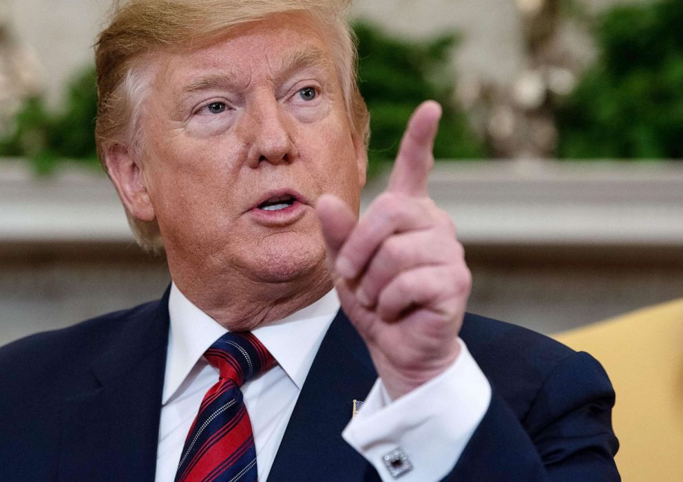 President Donald Trump gestures as he speaks speaks to the press during a meeting in the Oval Office at the White House in Washington, April 11, 2019.