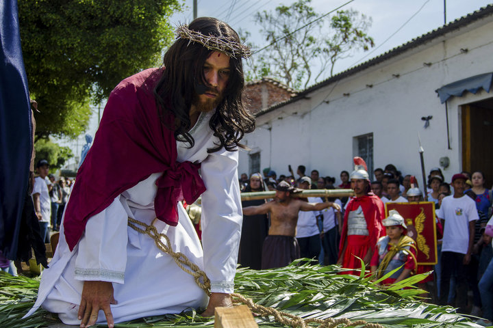 A Christian portraying Jesus recreates the Stations of the Cross during Good Friday on April 19, 2019, in Colima, Mexico.