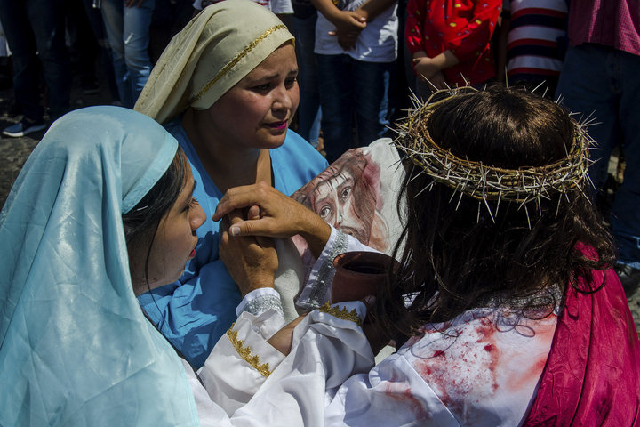Christians act out the Stations of the Cross in Colima, Mexico.