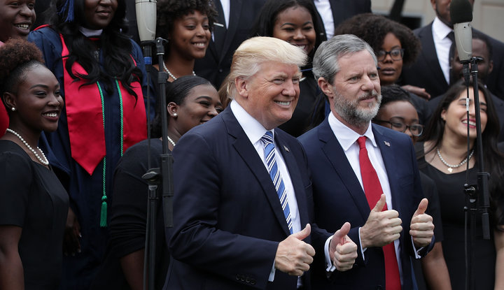 President Donald Trump and Jerry Falwell Jr., president of Liberty University, with members of a gospel choir during a May 13