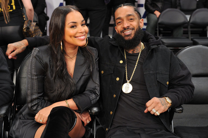 Lauren London and Nipsey Hussle at a&nbsp;Los Angeles Lakers game in November.