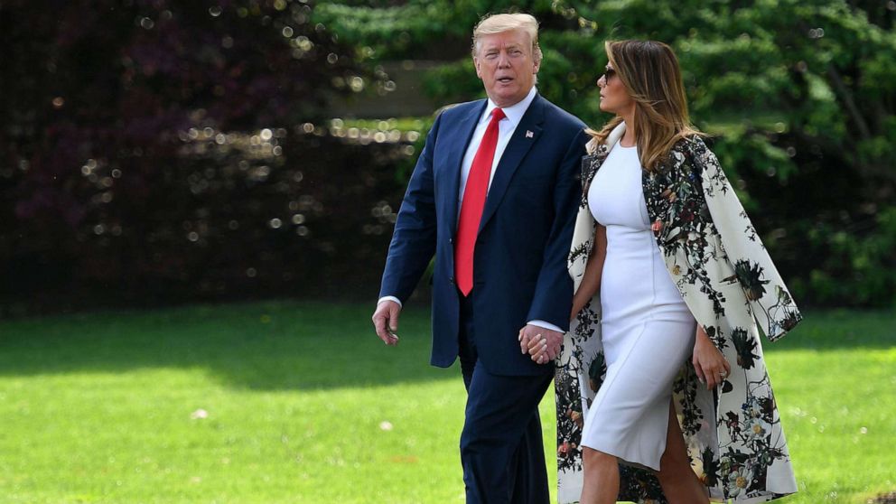 President Donald Trump and first lady Melania Trump walk together to board Marine One from the South Lawn of the White House in Washington, D.C., on April 18, 2019.