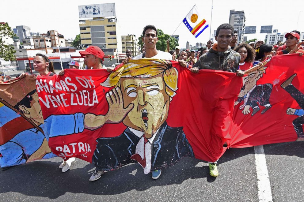PHOTO: Supporters of Venezuelan President Nicolas Maduro demonstrate against President Donald Trump during a pro-government May Day rally in Caracas on May 1, 2019.
