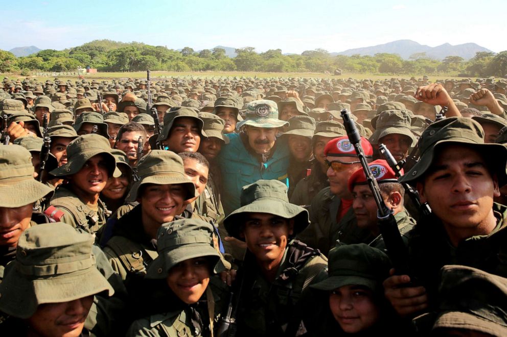 PHOTO: Venezuelas President Nicolas Maduro poses with soldiers during his visit to a military training center in El Pao, Venezuela, May 4, 2019.