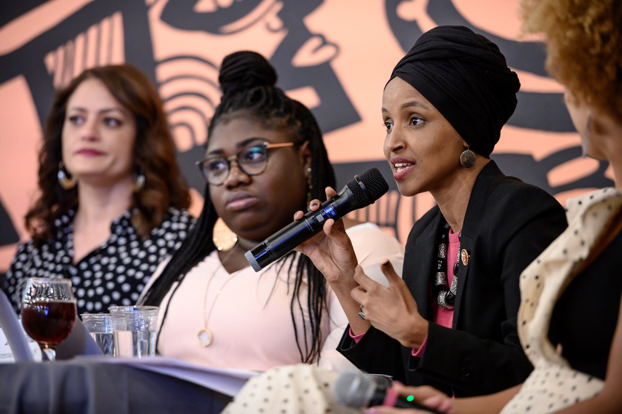 Omar speaks on a panel during the Paycheck Fairness and Women's Workforce Development Town Hall in Minneapolis on April 24, 2