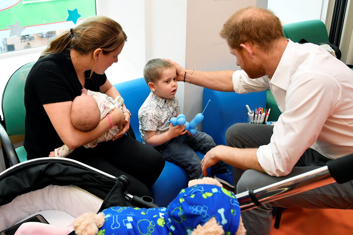 The duke visiting with some of the children at the hospital.&nbsp;