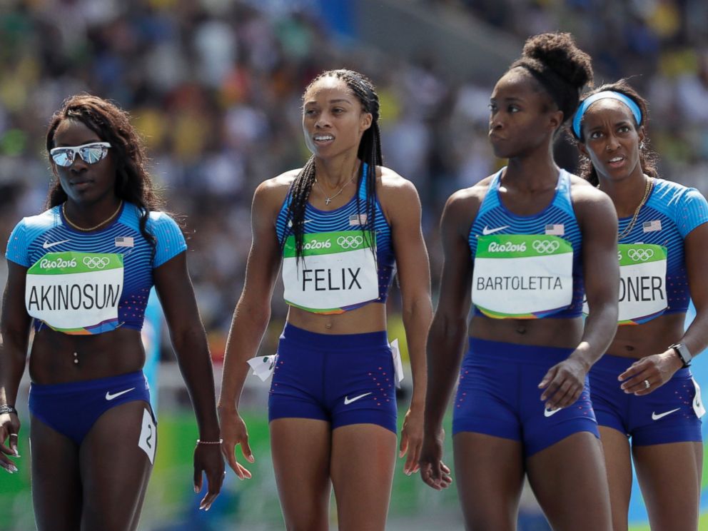 PHOTO: From left, members of the United States 4x100-meter relay team: Morolake Akinosun, Allyson Felix, Tianna Bartoletta and English Gardner walk to the finish after dropping the baton during the Summer Olympics in Rio de Janeiro, Aug. 18, 2016.