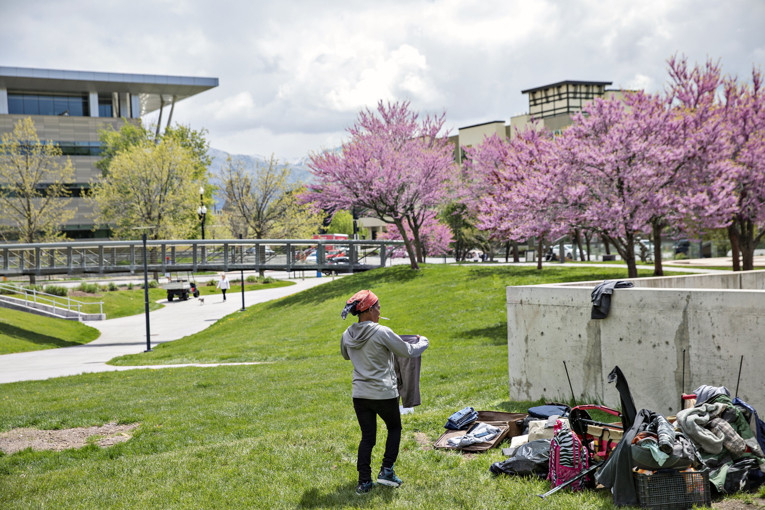 Dorriane Olson, 47, organizes her belongings in the courtyard at Library Square on May 1, 2019, in downtown Salt Lake City. O