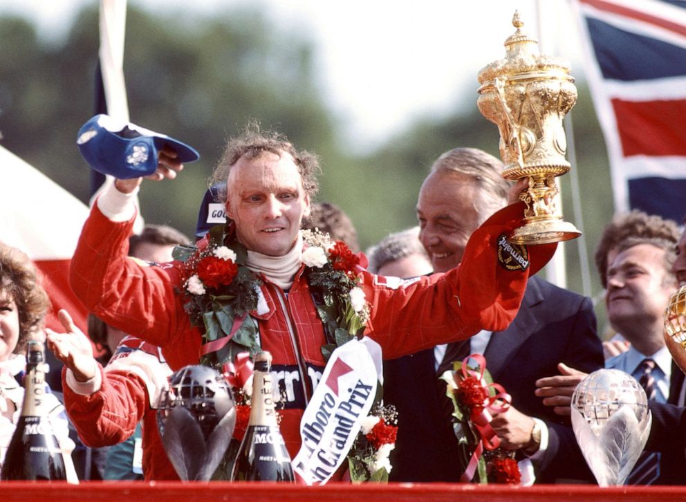 PHOTO: Niki Lauda of Austria lifts the RAC Trophy and celebrates winning the Marlboro British Grand Prix on July 18 1982, at the Brands Hatch circuit in Fawkham, England.