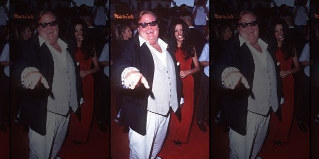 Chris Farley and his date at the Mann's Village Theatre in Westwood, Calif.