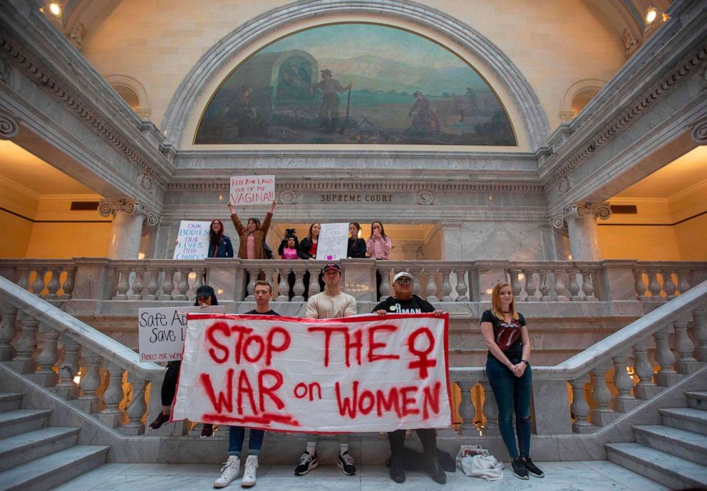 PHOTO: Abortion rights activists hold signs at a rally to oppose abortion bans and increased restrictions happening throughout the United States, at the State Capitol Building in Salt Lake City, Utah, May 21, 2019.