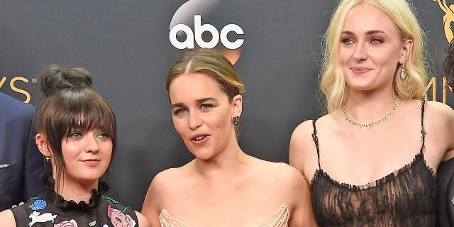 "Game of Thrones" stars Maisie Williams, Emilia Clarke and Sophie Turner pose together at the Emmys. The cast opened up about how much they cried after filming the "GoT" finale.