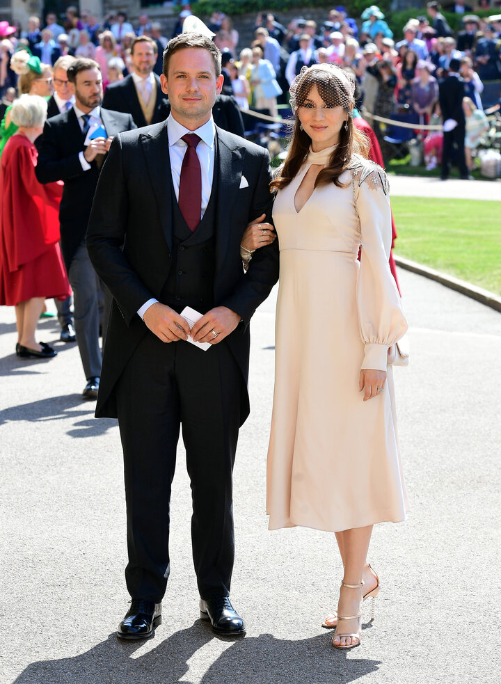 Patrick J. Adams and Troian Bellisario arrive at St. George's Chapel at Windsor Castle before the wedding of Prince Harry to 