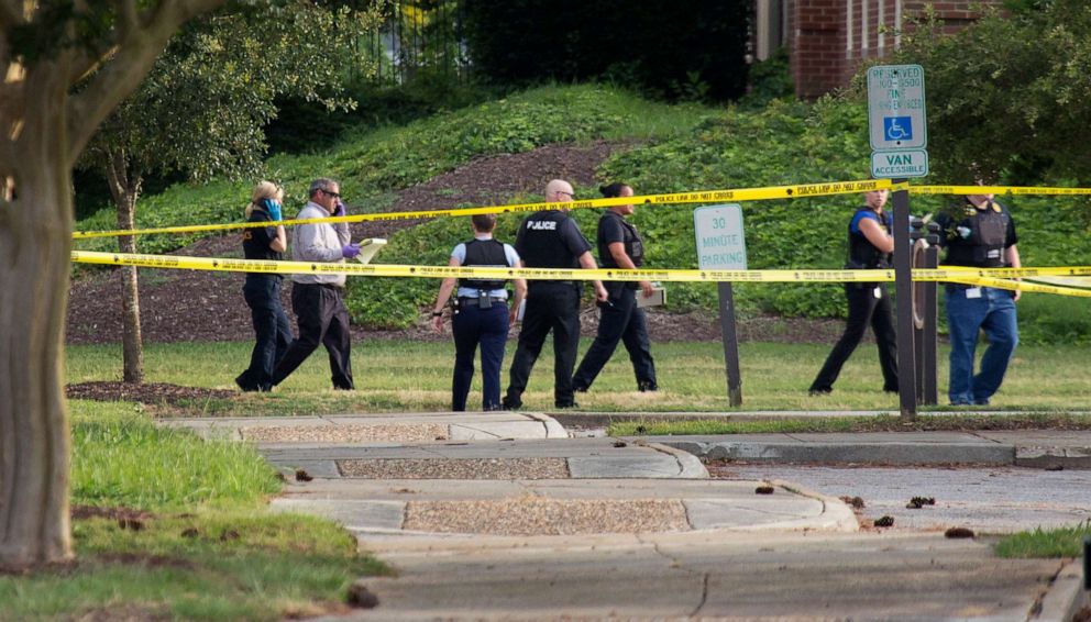 PHOTO: Police work the scene where eleven people were killed during a mass shooting at the Virginia Beach city public works building, May 31, 2019 in Virginia Beach, Va.