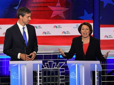 PHOTO: Beto ORourke and Amy Klobuchar participate in the first Democratic primary debate hosted by NBC News at the Adrienne Arsht Center for the Performing Arts in Miami, Florida, June 26, 2019.