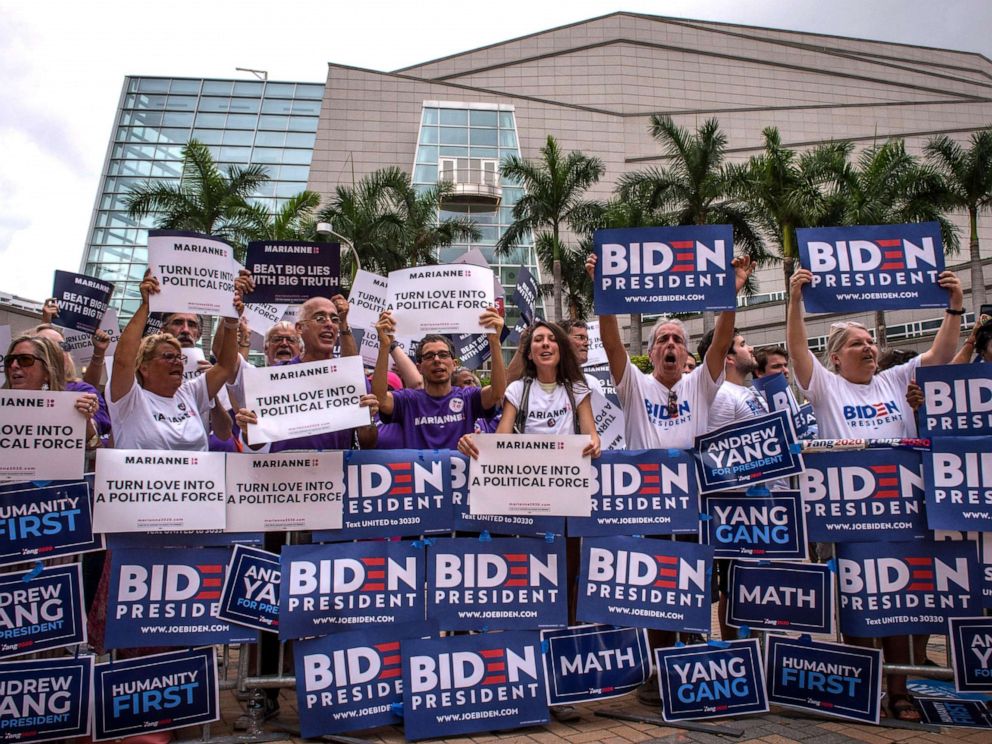 PHOTO: Supporters of different presidential candidates demonstrate outside of Adrienne Arsht Center of the Performing Arts, where the second night of the first Democratic Presidential Debate will be held, in Miami, June 27, 2019.