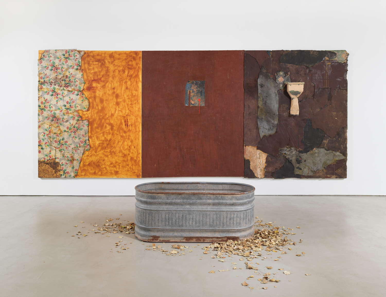 Harmony Hammond, Inappropriate Longings, 1992, oil, acrylic, canvas, linoleum, latex rubber, metal gutter and water trough, dry leaves, triptych.