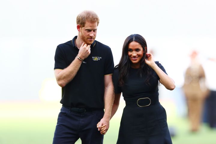 Harry and Meghan look on during the pre-game ceremonies before the MLB London game between the Boston Red Sox and the New Yor