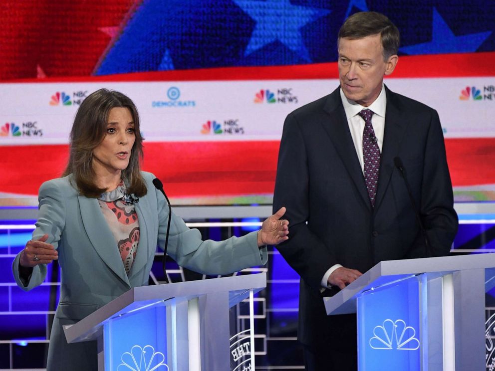 PHOTO: Marianne Williamson and John Hickenlooper participate in the second night of the first 2020 democratic presidential debate at the Adrienne Arsht Center for the Performing Arts in Miami, June 27, 2019.