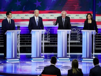 PHOTO: Pete Buttigieg, Joe Biden, Bernie Sanders and Kamala Harris participate in the second night of the first 2020 democratic presidential debate at the Adrienne Arsht Center for the Performing Arts in Miami, June 27, 2019.