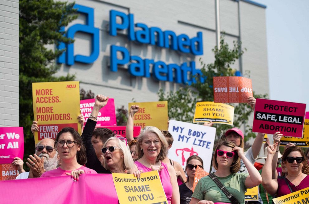 PHOTO: Pro-choice supporters and staff of Planned Parenthood hold a rally outside the Planned Parenthood Reproductive Health Services Center in St. Louis, May 31, 2019.
