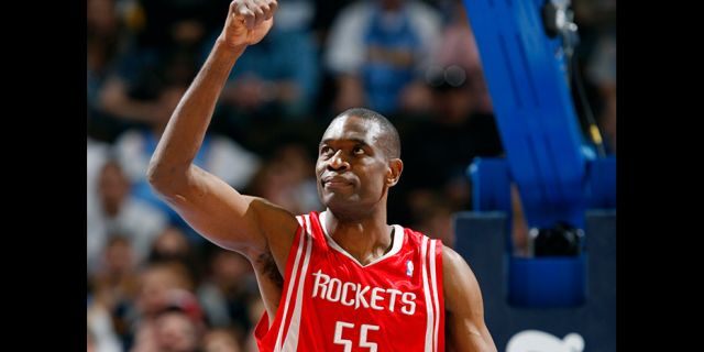 Houston Rockets center Dikembe Mutombo gestures while facing the Denver Nuggets in the first quarter of an NBA basketball game in Denver in 2008. (AP)