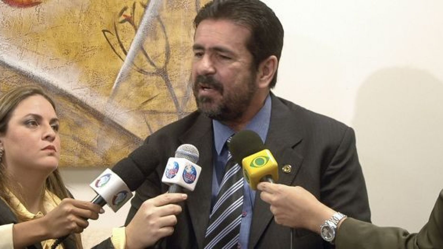 Late television show host Wallace Souza, center, seen here speaking during a news conference in Manaus, Brazil, Tuesday, Aug. 11, 2009. Brazilian police were investigating Souza on suspicion of commissioning at least five of the murders depicted in his shows to boost his ratings and prove his claim that Brazil's Amazon region is awash in violent crime. (AP Photo/A Critica, Antonio Menezes)