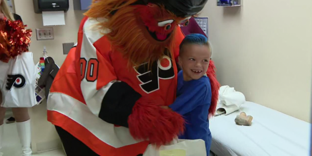 Caiden O'Rourke hugs Philadelphia Flyers mascot Gritty Tuesday, June 25 during a surprise visit by the mascot.