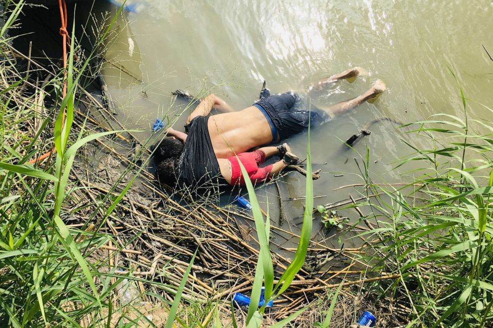 PHOTO: The bodies of a Salvadoran migrant and his daughter lie on the bank of the Rio Grande in Matamoros, Mexico, June 24, 2019, after they apparently drowned trying to cross the river to Brownsville, Texas.