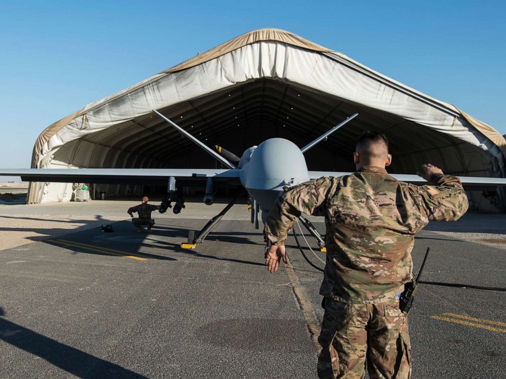 PHOTO: Airmen conduct flight control checks during preflight of a Reaper drone launch at an undisclosed location in Southwest Asia, Feb. 21, 2019.