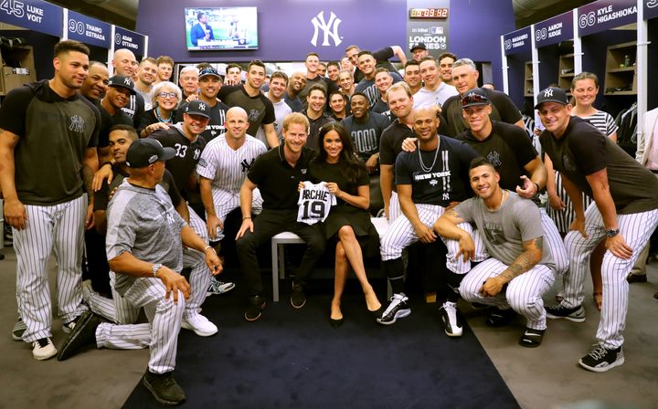The Duke and Duchess of Sussex join the New York Yankees in their clubhouse ahead of their game against the Boston Red Sox at