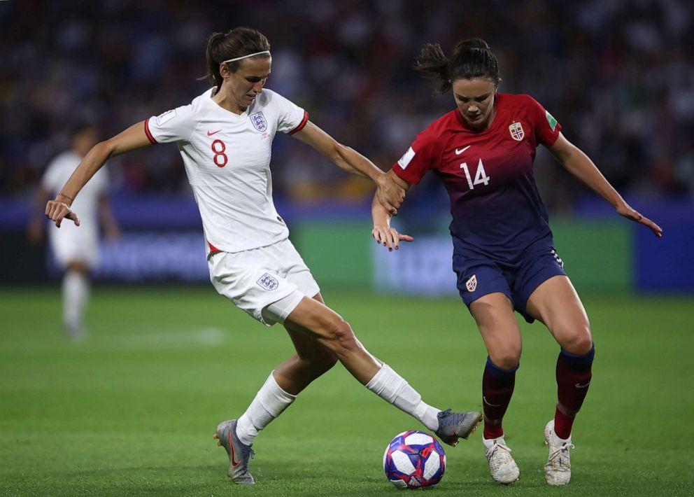PHOTO: Jill Scott of England is challenged by Ingrid Syrstad Engen of Norway during the 2019 FIFA Womens World Cup France Quarter Final match between Norway and England at Stade Oceane on June 27, 2019, in Le Havre, France.