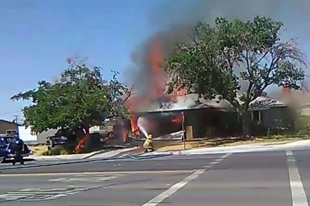 PHOTO: In this image taken from video provided by Ben Hood, a firefighter works to extinguish a fire, Thursday, July 4, 2019, following an earthquake in Ridgecrest, Calif.