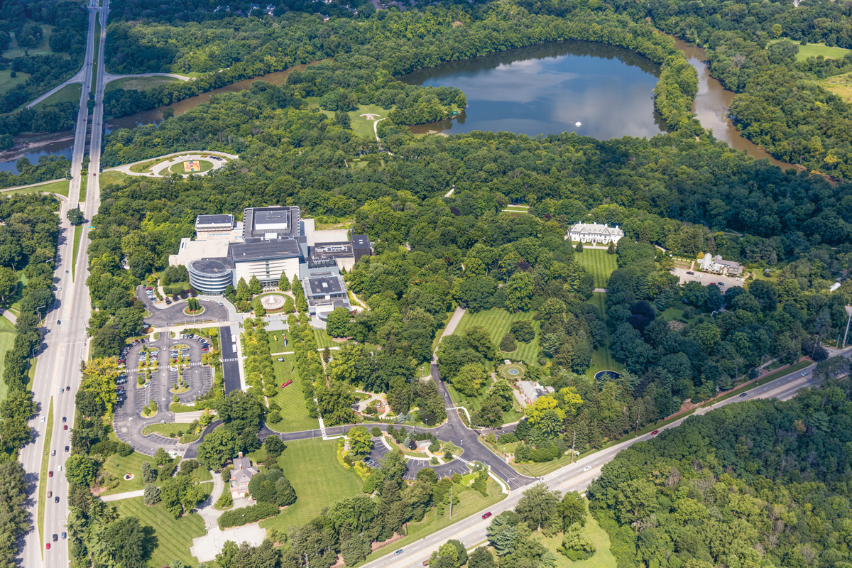 An aerial view of Newfields, with 100 Acres, at top, and the Lilly House and gardens, at right.