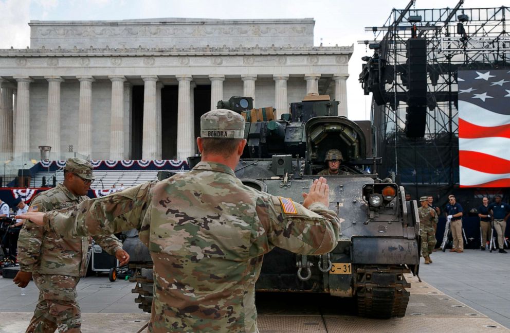 PHOTO: Soldiers with the 3rd Infantry Division, 1st Battalion, 64th Armored Regiment, move a Bradley Fighting Vehicle into place by the Lincoln Memorial, July 3, 2019.